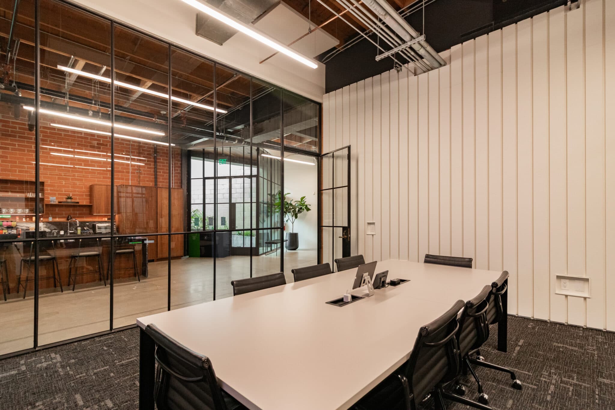 Open plan with exposed ceiling