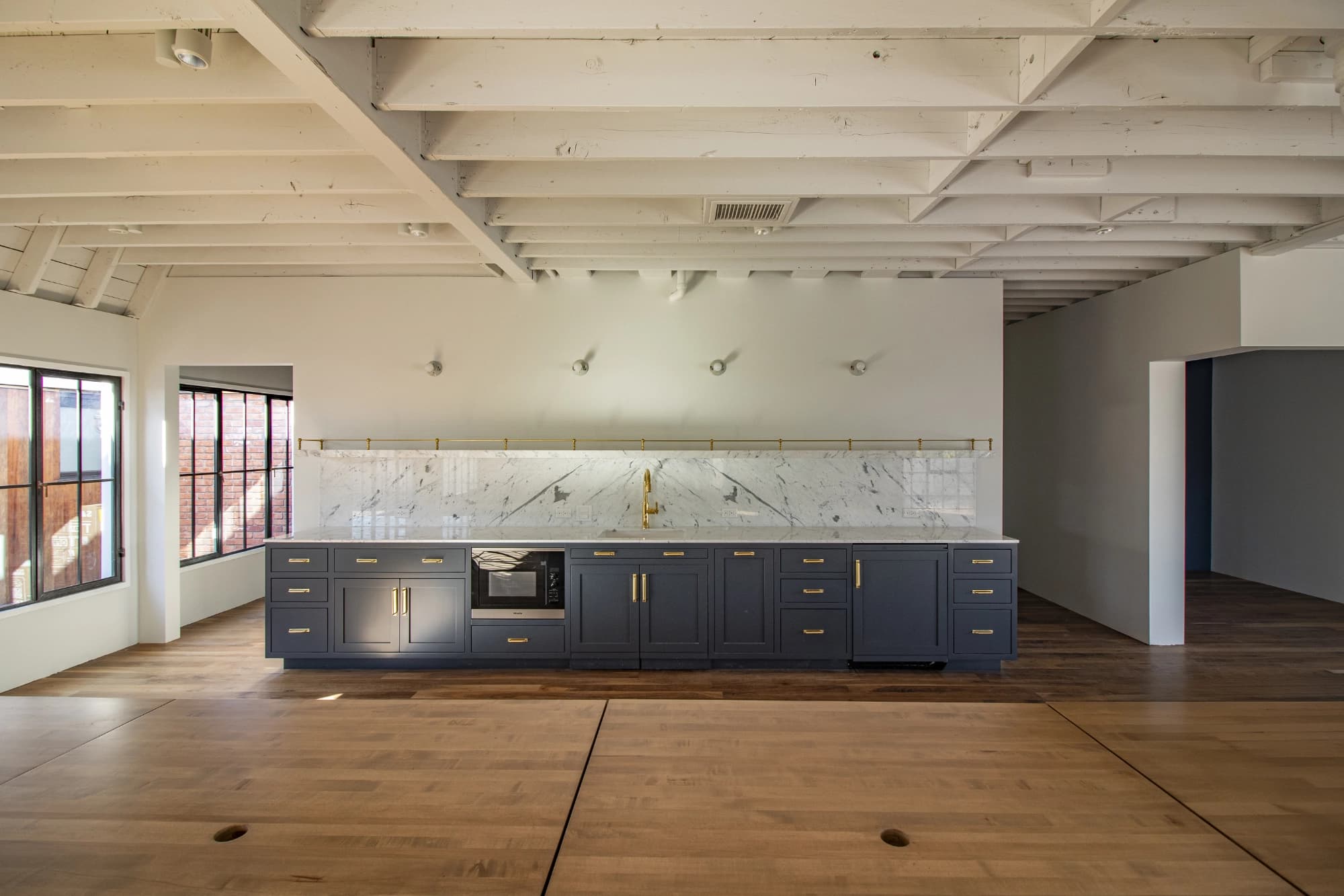 Interior workspace with natural light at 240 26th St