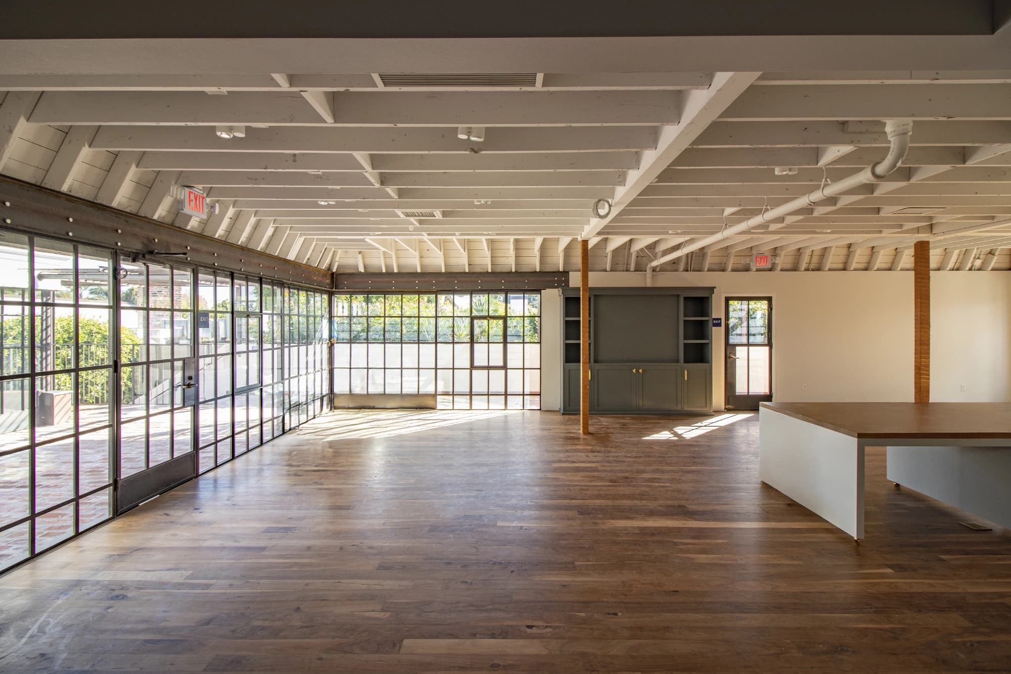 Open plan with polished floors at 240 26th St
